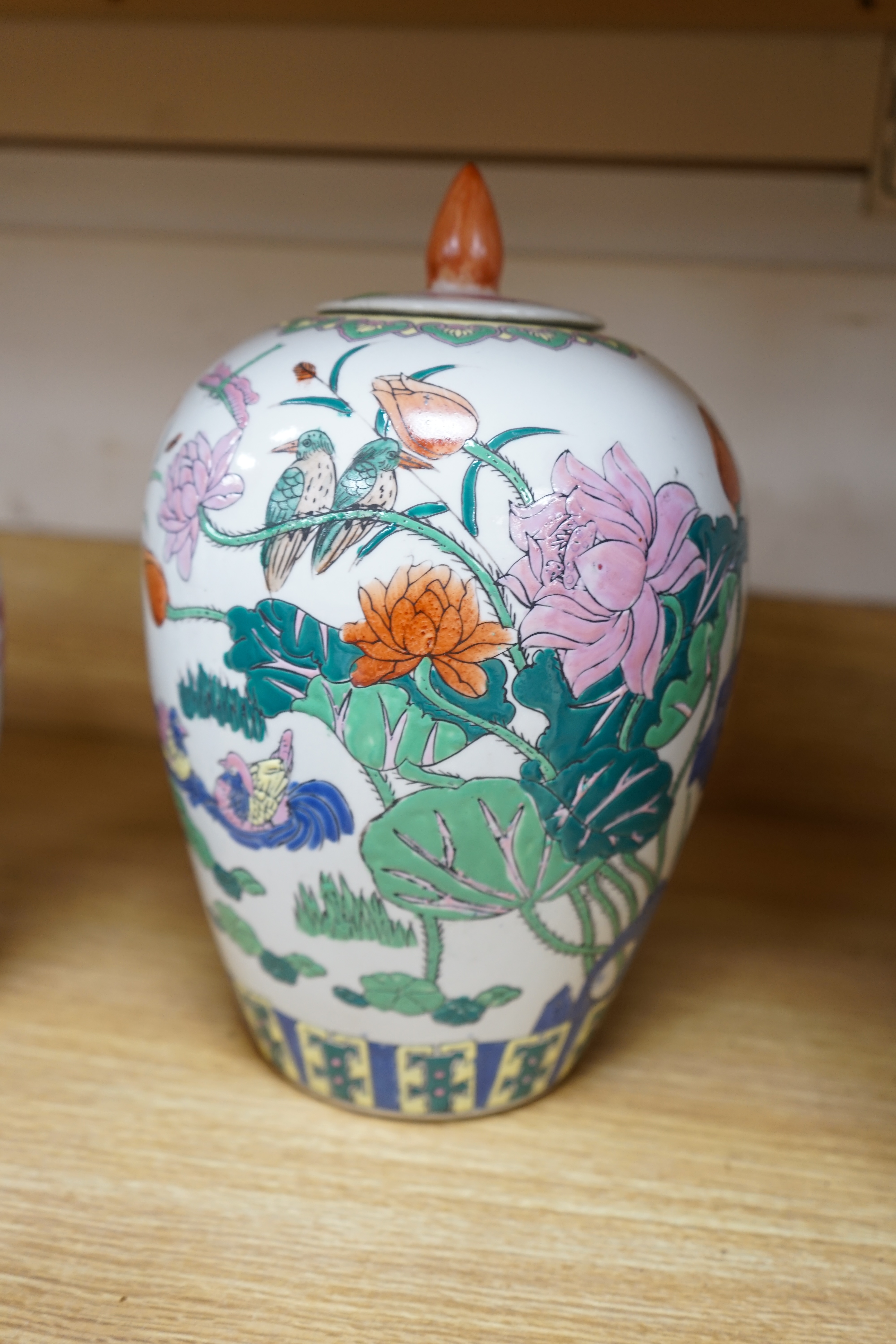 A collection of Chinese ceramics to include and bowls, plates, pottery dragon teapot and a green glaze water carrier, largest 31cm high. Condition - mostly fair